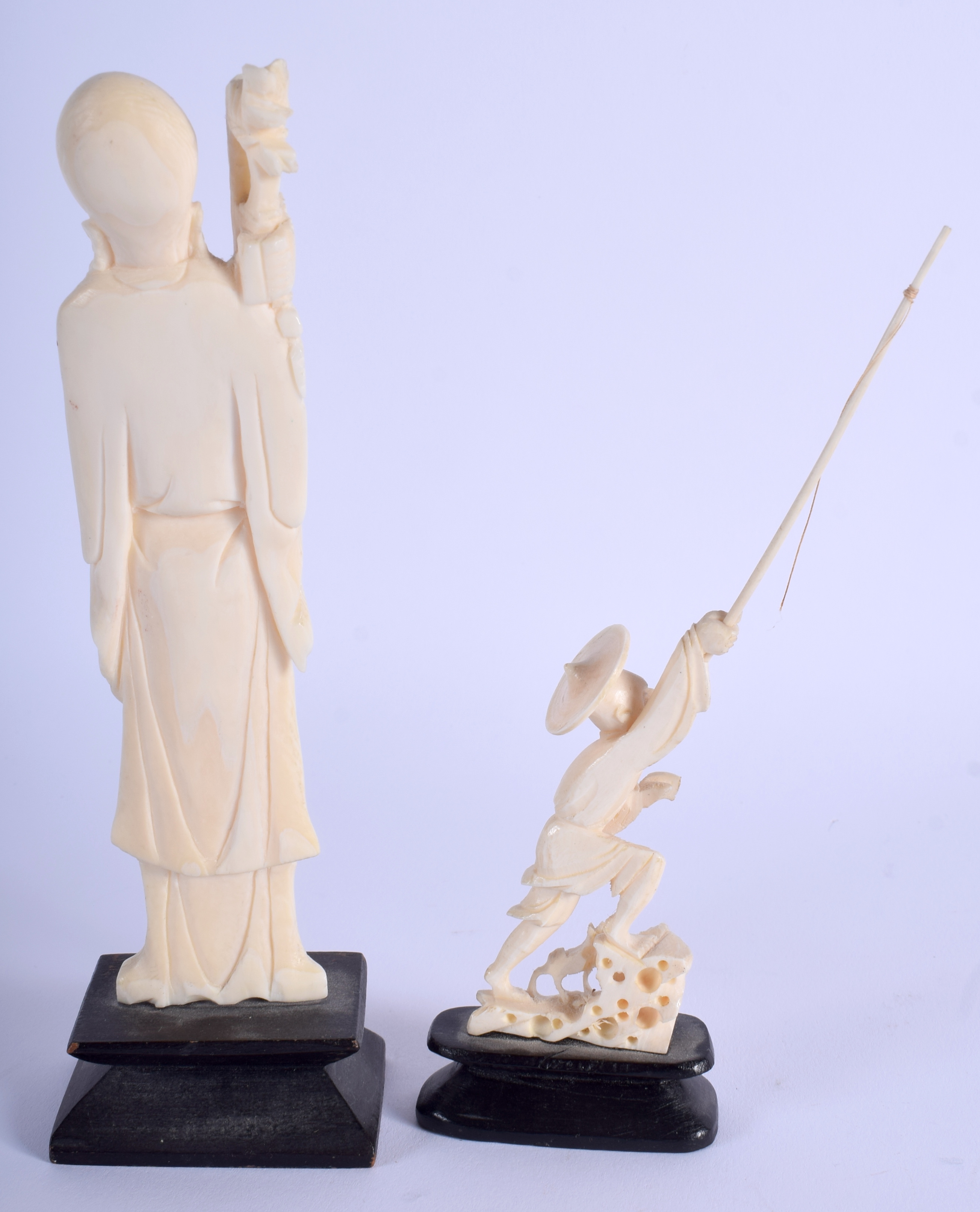 AN EARLY 20TH CENTURY CHINESE CARVED IVORY IMMORTAL together with another. Largest ivory 14 cm high - Image 2 of 2