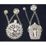 Two Chinese white open work metal pendants 90cm