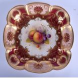 Royal Worcester square dish painted with fruit under a crimson and gilt border date code 1929. 24cm