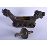 A LARGE CHINESE BRONZE MEDICINE HERB CRUSHER 20th Century, in the form of a dragon. 41 cm x 19 cm.