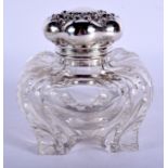 AN ART NOUVEAU SILVER TOPPED INKWELL. 9 cm wide.