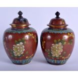 A PAIR OF EARLY 20TH CENTURY CHINESE CLOISONNE ENAMEL VASES AND COVERS Late Qing/Republic. 21 cm hi