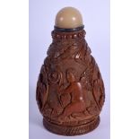 AN 18TH/19TH CENTURY CONTINENTAL CARVED COQUILLA NUT SNUFF BOTTLE. 7.75 cm high.