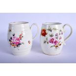 Derby good mug of barrel shape painted with a large rose centred floral spray and another earlier e