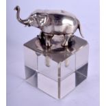 A 1920S SILVER ELEPHANT ON CUBE by Levi & Salaman. Birmingham 1925. 5.5 cm high.