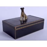 AN ART DECO COLD PAINTED DOGGY CIGARETTE BOX. 15 cm x 11 cm.