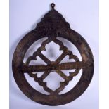 A MIDDLE EASTERN BRASS ISLAMIC ASTROLABE with calligraphic inscription. 27 cm wide.
