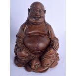 A 19TH CENTURY CHINESE CARVED HARDWOOD FIGURE OF A BUDDHA Qing. 16 cm x 10 cm.