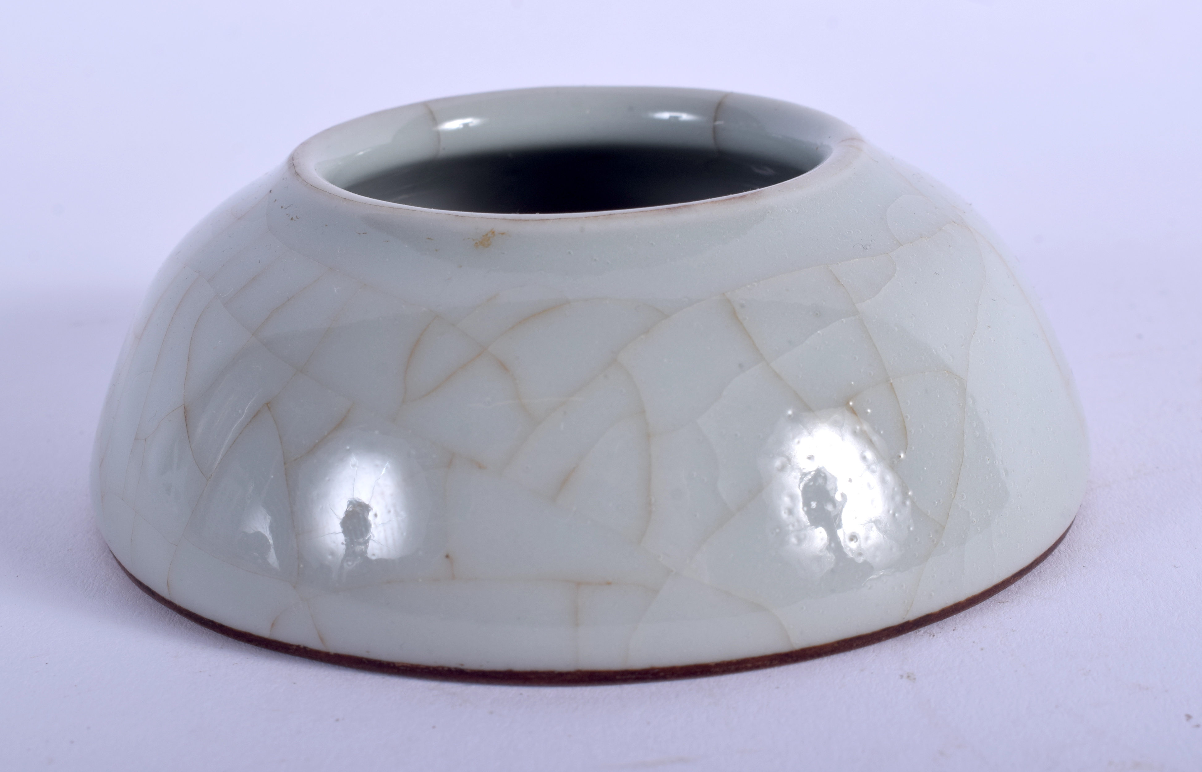 A CHINESE GE TYPE PORCELAIN MONOCHROME BRUSH WASHER 20th Century, bearing Qianlong marks to base. 7