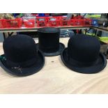 Two vintage Bowler hats and a Top Hat together with a quality leather hat box