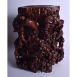 AN EARLY 20TH CENTURY CHINESE CARVED HARDWOOD BRUSH POT Late Qing/Republic, decorated with birds am