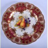 Royal Worcester plate painted with fruit under a crimson and gilt border date code 1929. 23cm diame