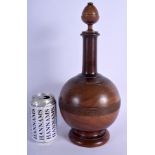 A VERY UNUSUAL 19TH CENTURY CARVED TREEN TEA CADDY in the form of a bulbous vase. 35 cm high.