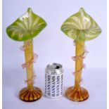 A PAIR OF EARLY 20TH CENTURY EUROPEAN FLUTED GLASS VASES probably Italian. 33 cm high.