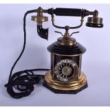 A VINTAGE ROTARY DIAL TELEPHONE modified by Expoga C1960. 30 cm high.