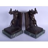 A PAIR OF CONTEMPORARY CONTINENTAL BRONZE DOG BOOK ENDS. 31 cm x 16 cm.