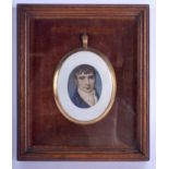 A LOVELY EARLY 19TH CENTURY YELLOW METAL CASED IVORY PORTRAIT MINIATURE depicting a handsome male i