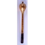 A TURKISH MIDDLE EASTERN BRONZE AND CARVED WOOD MACE decorated with foliage. 49 cm long.
