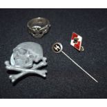 A collection of German Military WW2 items ring ,pin etc