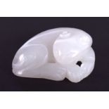 AN EARLY 20TH CENTURY CHINESE CARVED WHITE JADE FIGURE OF A CAT Late Qing/Republic. 3 cm x 2.75 cm.