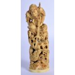 A 19TH CENTURY JAPANESE MEIJI PERIOD CARVED IVORY OKIMONO modelled as Agatamori fighting Mizuchi th