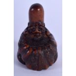 A 19TH CENTURY JAPANESE MEIJI PERIOD CARVED BOXWOOD NETSUKE modelled as a seated scholar. 4.5 cm x
