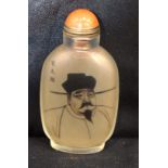 Chinese snuff bottle decorated with a Chinese male and calligraphy. 9.5cm