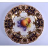 Royal Worcester plate painted with fruit and flowers under an elaborate gilt cobalt blue and salmon