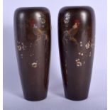 A PAIR OF 19TH CENTURY JAPANESE MEIJI PERIOD BRONZE VASES decorated with fowl amongst foliage. 15.5