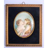 A LATE 19TH CENTURY CONTINENTAL PAINTED IVORY PORTRAIT MINIATURE depicting a couple kissing. Image