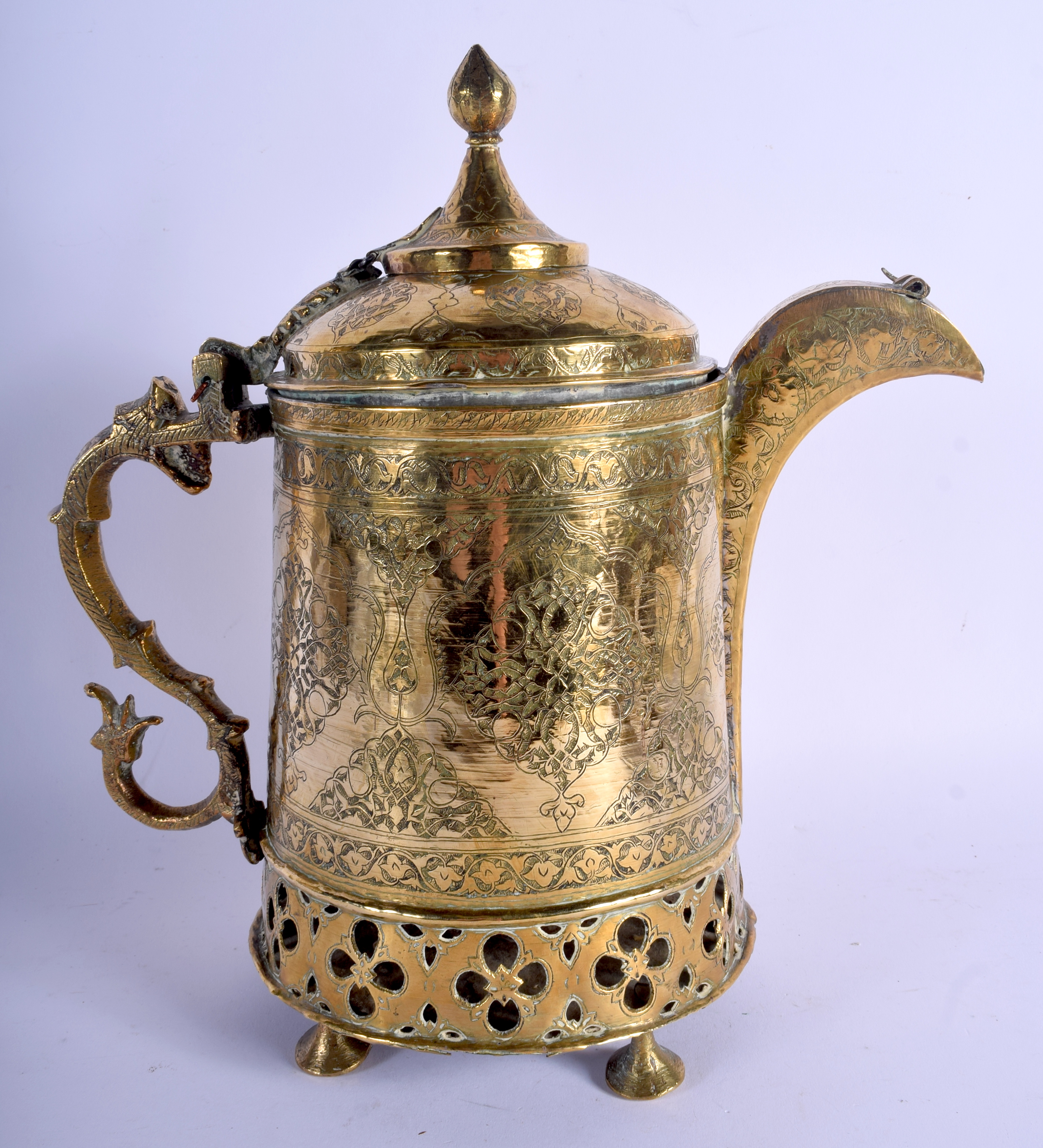 A LARGE 19TH CENTURY MIDDLE EASTERN BRASS KUFIC EWER decorated with foliage and vines. 30 cm x 22 c