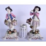 A LARGE PAIR OF 19TH CENTURY SAMSONS OF PARIS FIGURES modelled as a drummer and pipe player. 28 cm