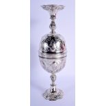 AN ANTIQUE CONTINENTAL SILVER DOUBLED ENDED STACKING CUPS possibly for wagering, decorated with put