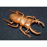 A small Japanese bronze stag beetle