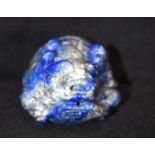 Lapis Lazuli carved bolder in the shape of a beast