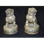 A pair of Chinese white metal lions 11 cm