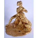 A MID 19TH CENTURY ENGLISH GILT BRONZE FIGURE OF A SEATED SOLDIER by Messenger & Sons, modelled bes