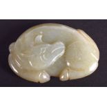 A 19TH CENTURY CHINESE GREEN JADE FIGURE OF A STYLISED BULL Qing. 5.5 cm x 4.25 cm.