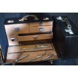 Two leather cases of vintage Dentistry equipment