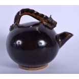AN EARLY 20TH CENTURY CHINESE BROWN GLAZED TEAPOT Late Qing/Republic. 11 cm wide.