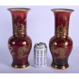 A PAIR OF ART DECO CARLTON WARE ROUGE ROYALE VASES decorated with dragons. 29.5 cm high.