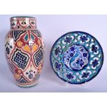 A MIDDLE EASTERN IZNIK FAIENCE TYPE POTTERY VASE together with a similar open work dish. Largest 30