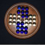 A Victorian small Solitaire board with marbles