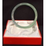 A Chinese jade bangle. 7.5cm