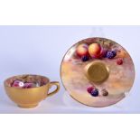 A ROYAL WORCESTER FRUIT PAINTED CUP AND SAUCER by Hale & Price. (2)