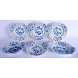 FOUR MEISSEN BLUE AND WHITE PLATES together with two baskets. Largest 29 cm wide. (6)