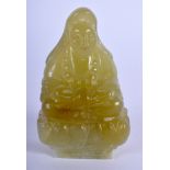 AN EARLY 20TH CENTURY CHINESE CARVED GREEN JADE FIGURE OF GUANYIN Late Qing/Republic. 7 cm x 4.25 c