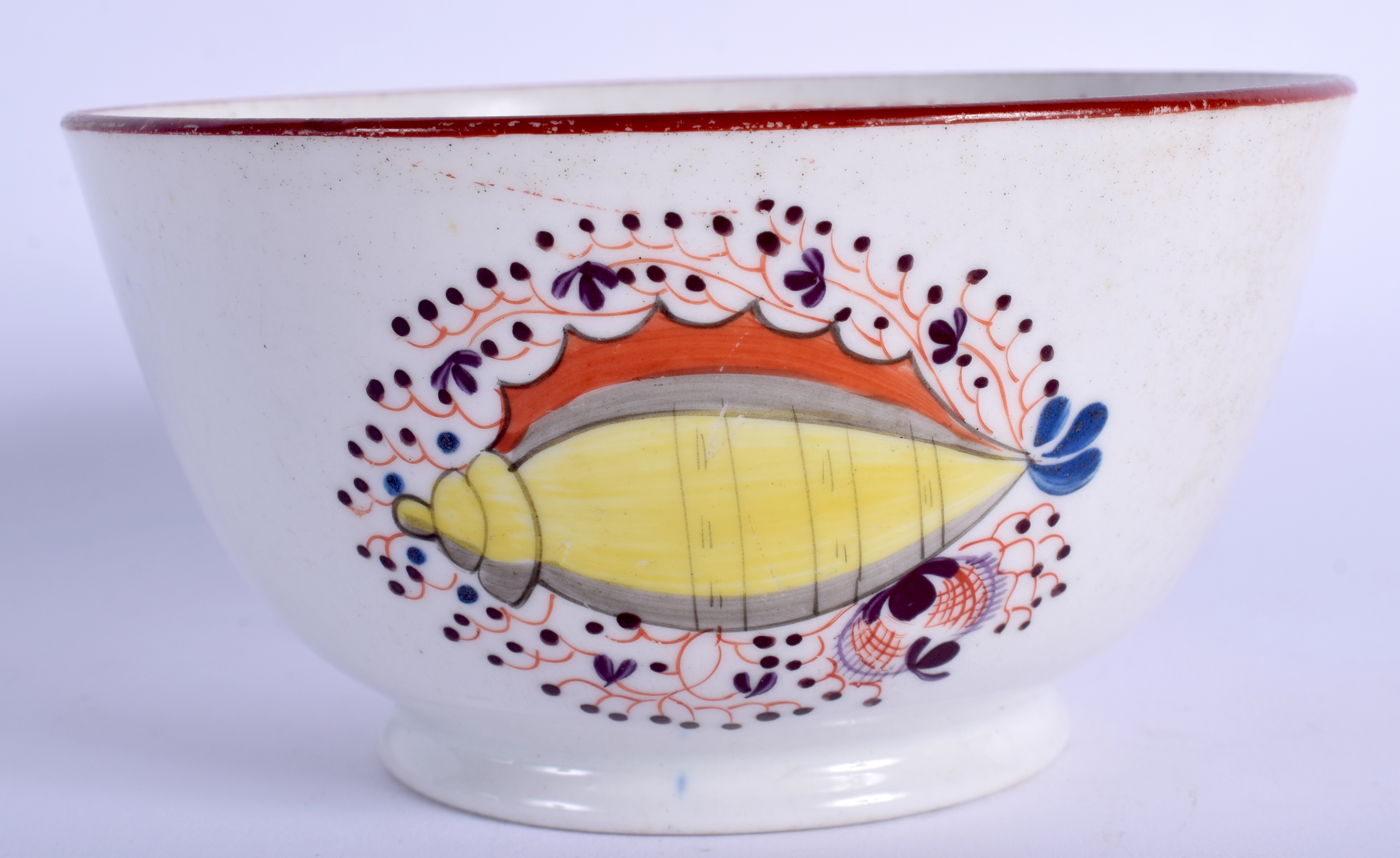 A LATE 18TH CENTURY ENGLISH PORCELAIN SLOP BOWL painted with shells. 12 cm diameter.