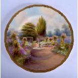 Royal Worcester superb plate painted with flowers in a garden scene by Raymond Rushton signed date