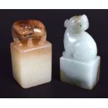 TWO CHINESE CARVED JADE SEALS 20th Century. Largest 2.75 cm x 2.5 cm. (2)